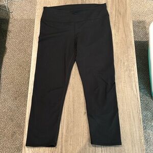 Black cropped fabletics leggings.